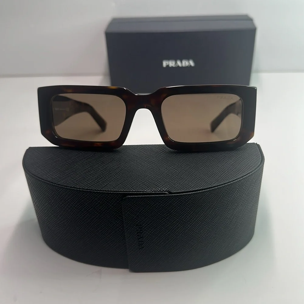 Prada PR06YS Brown Sunglasses with Bold Frames and UV Protection